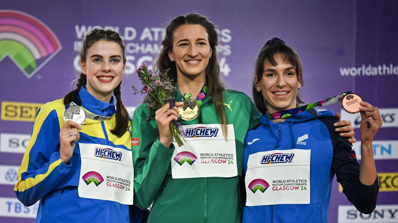 Silver medallist Yaroslava Mahuchikh, Australia's Nicola Olyslagers and bronze medallist Slovenia's Lia Apostolovski. (Photo by Ben Stansall / AFP)