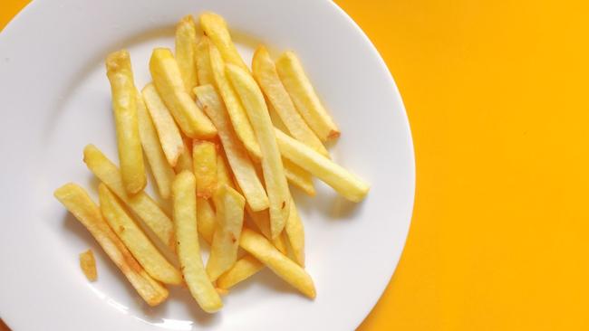 A small baked potato contains 128 calories and 0.18g of fat, while the same weight of chips provides about 431 calories and 20g of fat. Picture: Getty Images