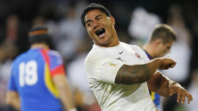 England’s Manu Tuilagi celebrates scoring a try during the 2011 Rugby World Cup.