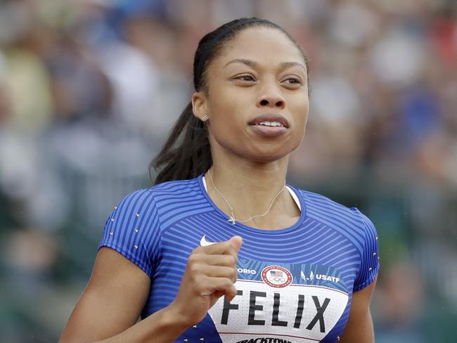 Allyson Felix wins her heat during qualifying for women's 200-meter run at the U.S. Olympic Track and Field Trials, Friday, July 8, 2016, in Eugene Ore. (AP Photo/Marcio Jose Sanchez)