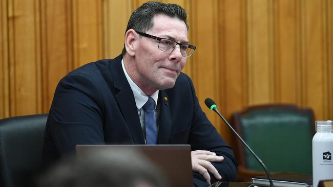 Mayor Troy Thompson during a Townsville City Council meeting, as he listens to councillor Kristian Price’s calls for a public apology. Picture: Shae Beplate.