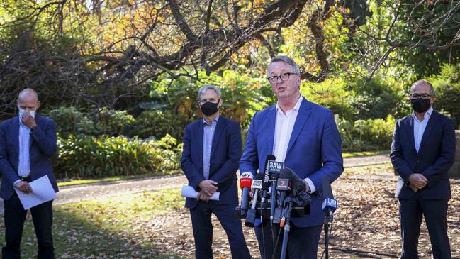 Chief Health Officer Brett Sutton, acting Premier James Merlino, and Health Minister Martin Foley. Picture: Wayne Taylor