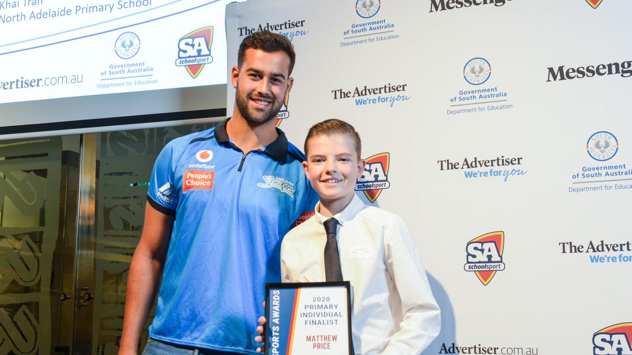 Cricketer Wes Agar with finalist Matthew Price from North Haven Primary School at The School Sports Awards at the SA Museum. Picture: Brenton Edwards