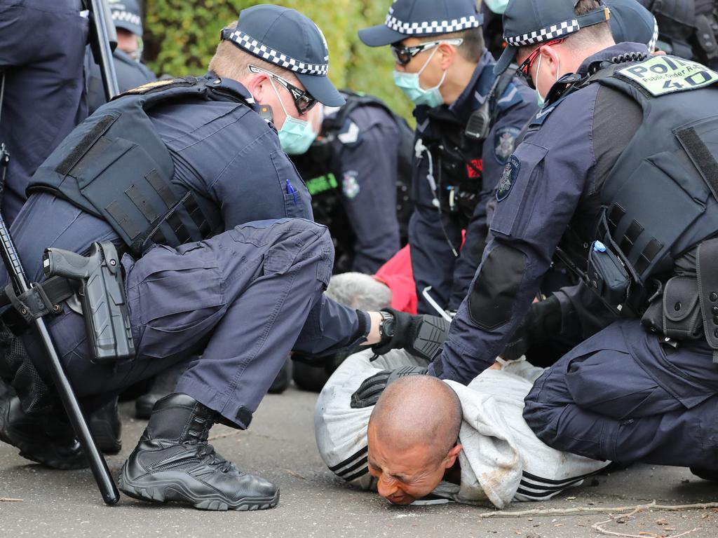 An anti-lockdown protester is arrested in Melbourne last week. Picture: Alex Coppel