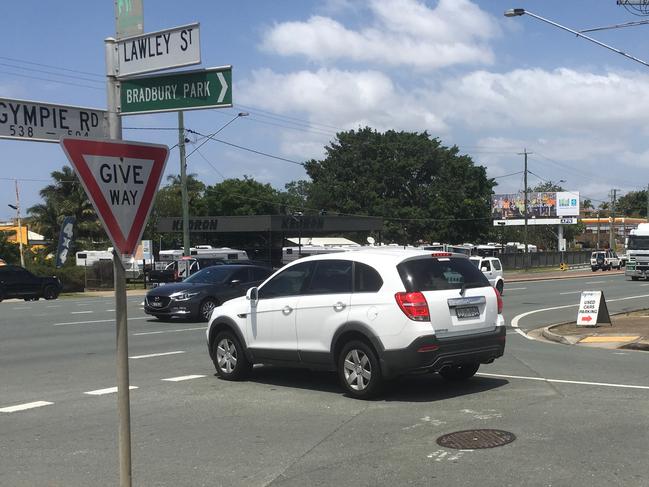 A vehicle waits to turn right at the corner of Lawley St and Gympie Rd. Once the Northern Transitway is completed, motorists will be banned from making a right-hand turn. Pic: Darren Cartwright