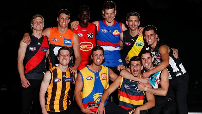 MELBOURNE, AUSTRALIA - NOVEMBER 24: (Top L-R) Ben Hobbs of the Bombers, Finn Callaghan of the Giants, Mac Andrew of the Suns, Sam Darcy of the Bulldogs, Josh Gibcus of the Tigers, Nick Daicos of the Magpies, (bottom L-R) Josh Ward of the Hawks, Campbell Chesser of the Eagles, Josh Rachele of the Crows and Josh Sinn of the Power pose for photos during the NAB AFL Draft at the London Tavern on November 24, 2021 in Melbourne, Australia. (Photo by Michael Willson/AFL Photos via Getty Images)