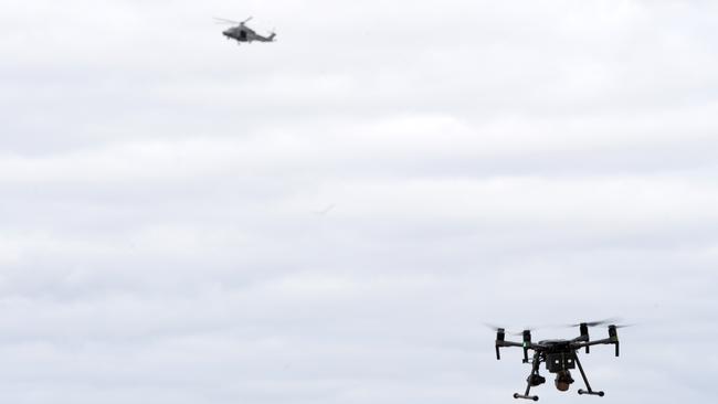 Drones and a police helicopter were used in the search efforts. Picture: Andrew Henshaw