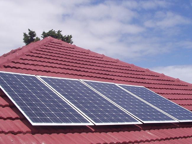 HOMES A generic photo of house with solar panels on roof.