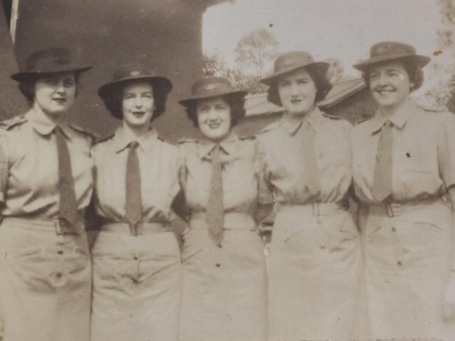 Joyce Grace (left), Coral Hinds (r) and other members of the Garage Girls during World War Two. Picture: Courtesy of Joyce Grace