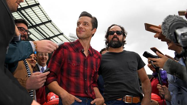 Brandon Flowers (left) and Ronnie Vannucci Jr. of American rock band The Killers have postponed ticket sales for their Australian tour. Picture: AAP Image/Joe Castro.