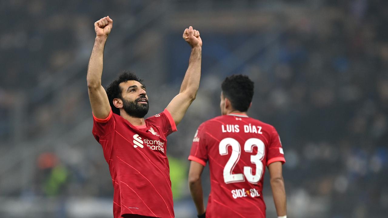 MILAN, ITALY - FEBRUARY 16: Mohamed Salah of Liverpool celebrates after scoring their side's second goal during the UEFA Champions League Round Of Sixteen Leg One match between Inter and Liverpool FC at Giuseppe Meazza Stadium on February 16, 2022 in Milan, Italy. (Photo by Shaun Botterill/Getty Images)