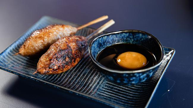 Chicken meatball with tare and cured egg yolk. Picture: Jason Edwards.