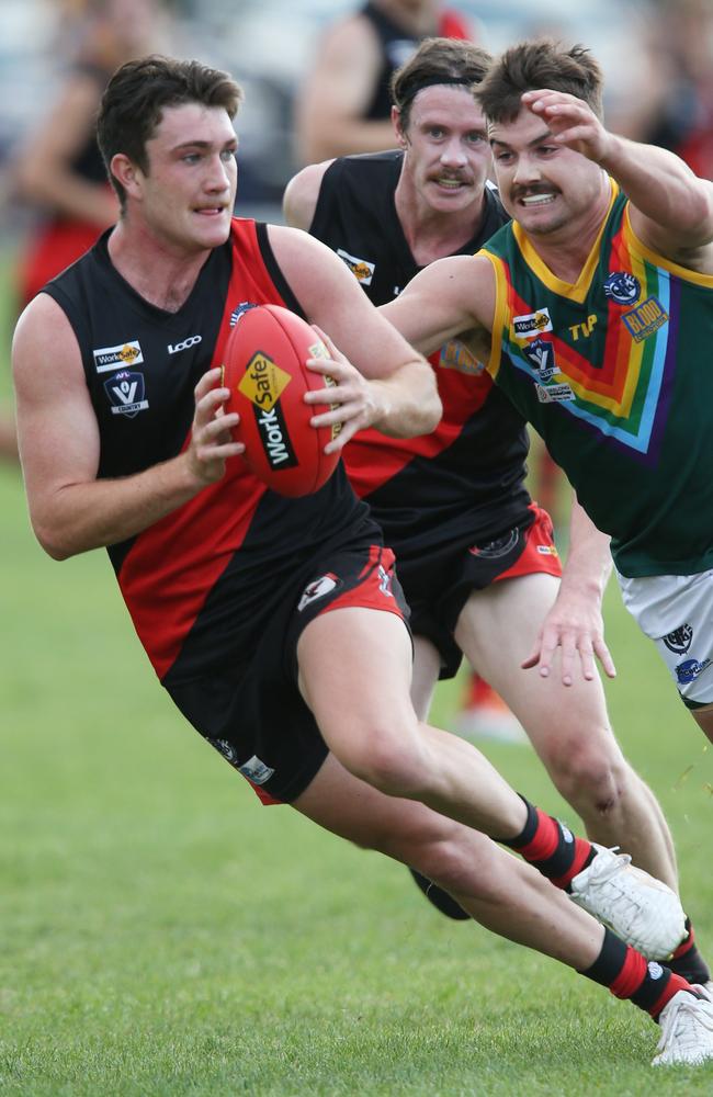 Leopold’s Mitchell Patten chases Newtown &amp; Chilwell’s Charlie Byrne. Picture: Mark Wilson