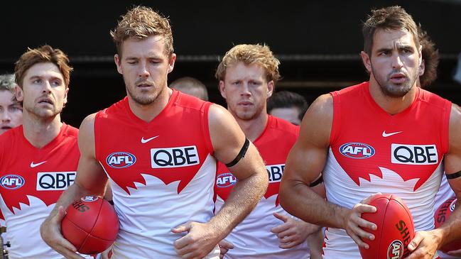 Josh Kennedy (right) will take a leadership back seat in 2022, with (from left) Dane Rampe, Luke Parker and Callum Mills to serve as co-captains. Picture: Michael Klein