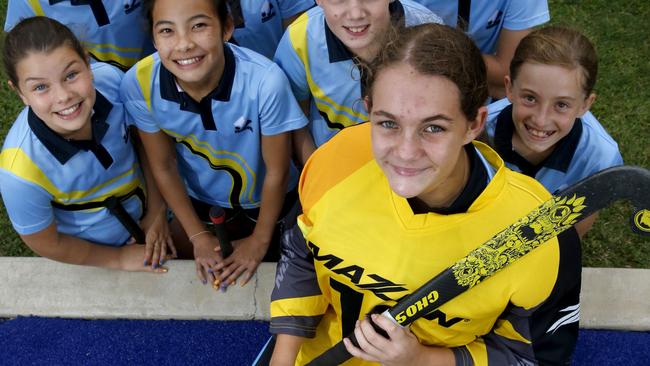 Rhiannon Forbes and Cairns teammates ahead of the 2019 U13 State Hockey Championships. PICTURE: ANNA ROGERS