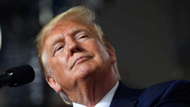 US President Donald Trump speaks during a campaign rally in Manchester, New Hampshire.