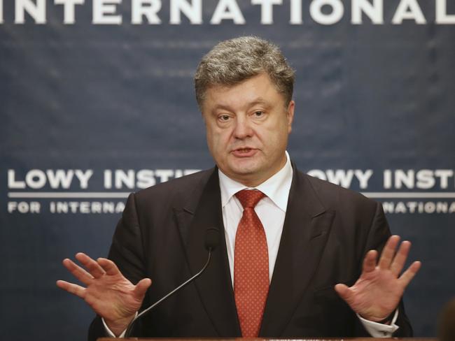 Ukraine President Petro Poroshenko speaks at the Lowy Institute in Sydney, Friday, Dec. 12, 2014. (AP Photo/Rick Rycroft)