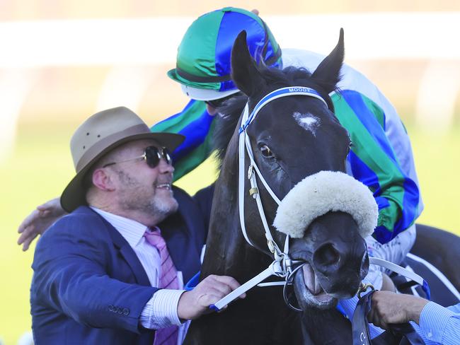 Luke Nolan on I Wish I Win greets trainer Peter Moody as he returns to scale after winning race 8 the XXXX Golden Eagle during Sydney Racing at Rosehill Gardens on October 29, 2022 in Sydney, Australia. (Photo by Mark Evans/Getty Images)