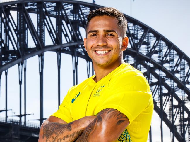 SYDNEY, AUSTRALIA - MARCH 31: Maurice Longbottom poses during the Australian Olympic Team Tokyo 2020 uniform unveiling at the Overseas Passenger Terminal on March 31, 2021 in Sydney, Australia. (Photo by Hanna Lassen/Getty Images)