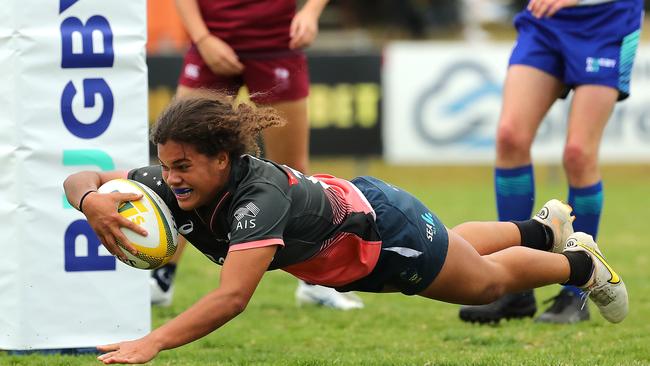 Dominika Baleinagasau of the Barbarians scoring against Queensland.