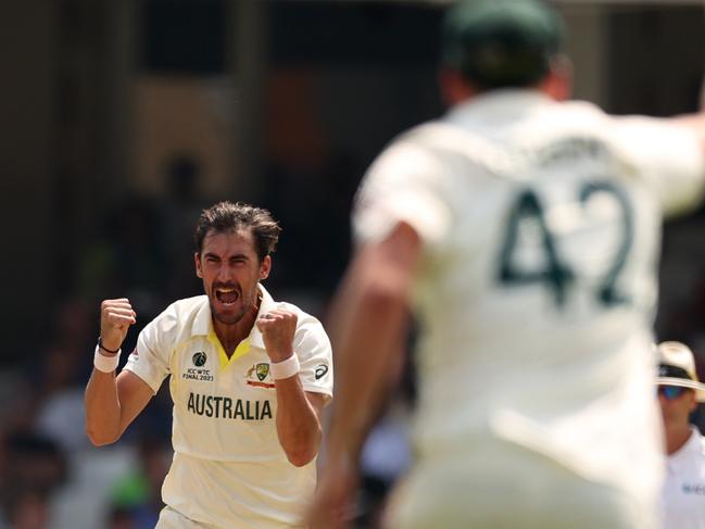Mitch Starc celebrates the wicket of Ajinkya Rahane. (Photo by Ryan Pierse/Getty Images)