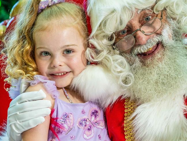 Santa visits the Royal ChildrenÃs Hospital and meets the RCH face of Christmas Sammi Di Nardo (5yrs). Picture: Jake Nowakowski