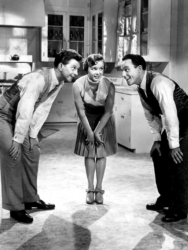 Actors Donald O’Connor (L), Gene Kelly & Debbie Reynolds perform in 1974 film “That’s Entertainment”.