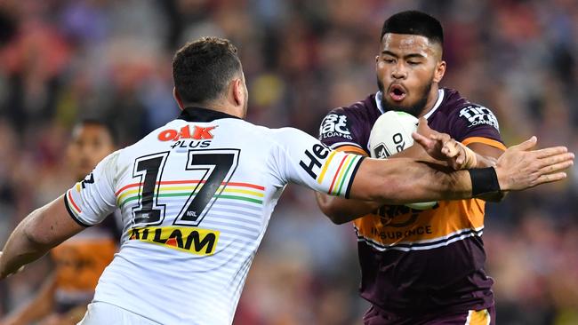 Payne Haas looks to break through the Reagan Campbell-Gillard tackle. Picture: AAP Image/Darren England