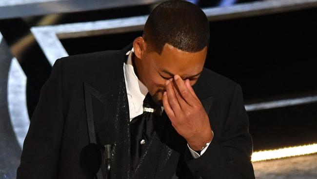 Smith during his tearful acceptance speech. (Photo by Robyn Beck / AFP)