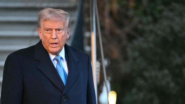 US President Donald Trump walks to speak to reporters before boarding Marine One as he departs from the South Lawn of the White House in Washington, DC on January 31, 2025 en route to his Mar-a-Lago resort in Palm Beach, Florida. (Photo by Mandel NGAN / AFP)