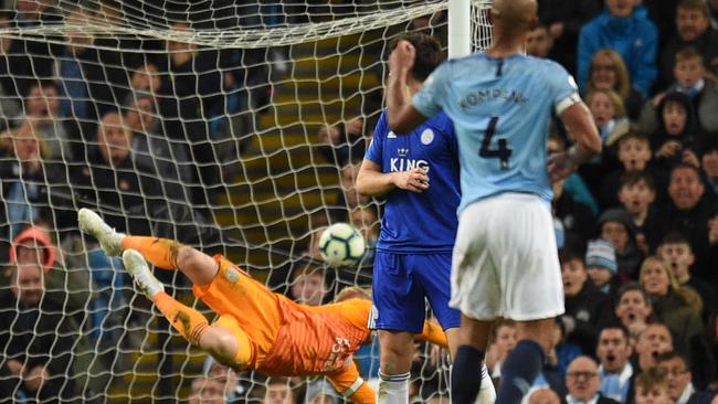 Vincent Kompany watches as his shot beats Leicester City goalkeeper Kasper Schmeichel. Picture: AFP