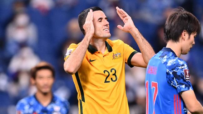 Australia's midfielder Tomas Rogic (2nd-L) reacts after missing an attempt during the 2022 Qatar World Cup Asian Qualifiers group B football match between Japan and Australia, at Saitama Stadium in Saitama, on October 12, 2021. (Photo by CHARLY TRIBALLEAU / AFP)