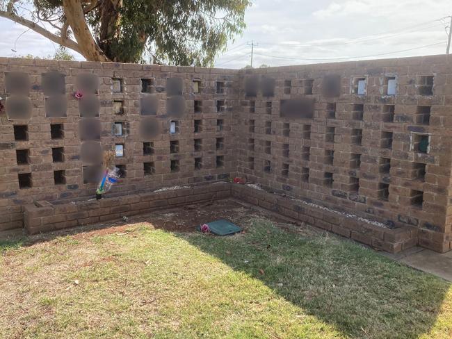 Fifteen metal plaques were stolen from a brick wall niche at a Bacchus Marsh cemetery. Picture: Supplied