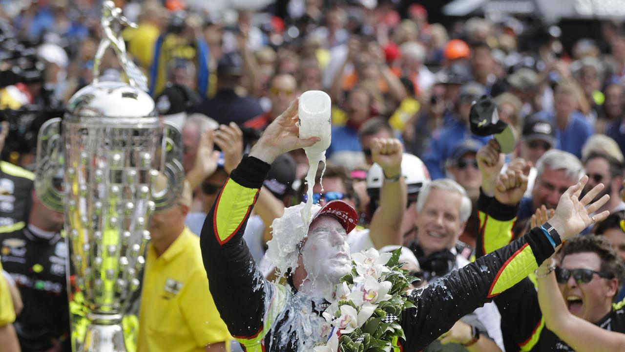Simon Pagenaud, of France, celebrates after winning the Indianapolis 500.