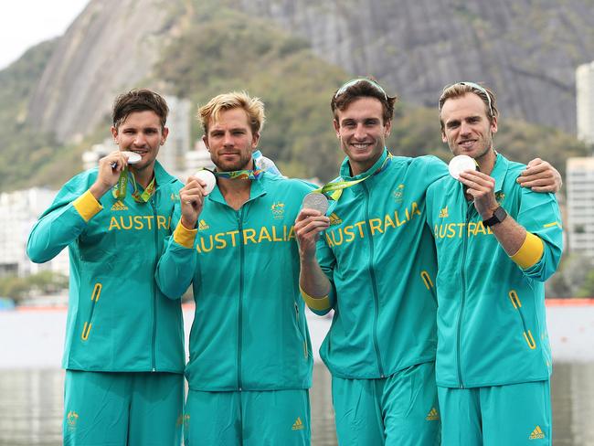 Australia's (L to R) Alexander Hill, Joshua Booth, Joshua Dunkley-Smith and William Lockwood celebrate winning the silver medal in the Men's Four final at Lagoa Stadium at the Rio 2016 Olympic Games. Picture: Brett Costello