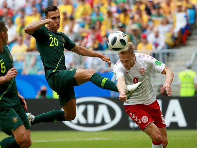 SoccerooÕs Trent Sainsbury controls the ball in in front of DenmarkÕs Nicolai Jorgensen during the World Cup match between Australia and Denmark at Samara Arena, Russia. Picture: Toby Zerna