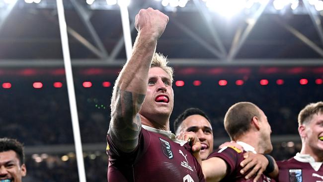 BRISBANE, AUSTRALIA - JUNE 21: Cameron Munster of Queensland celebrates a try by team mate Hamiso Tabuai-Fidow of Queensland during game two of the State of Origin series between the Queensland Maroons and the New South Wales Blues at Suncorp Stadium on June 21, 2023 in Brisbane, Australia. (Photo by Bradley Kanaris/Getty Images)