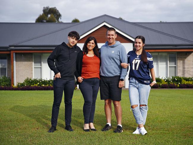 24/3/22 WEEKEND TELEGRAPH SPECIAL. MUST NOT USE BEFORE CLEARING WITH PIC EDITOR JEFF DARMANIN. Rebecca Mitchell, husband Justin Mitchell, daughter Tahlia, 16, and son Jacob, 14 pictured at their Luddenham home today. Picture: Sam Ruttyn