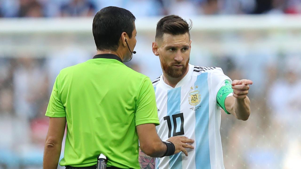 Veteran referee Alireza Faghani speaks with Lionel Messi of Argentina during the 2018 FIFA World Cup. (Photo by Alexander Hassenstein/Getty Images)