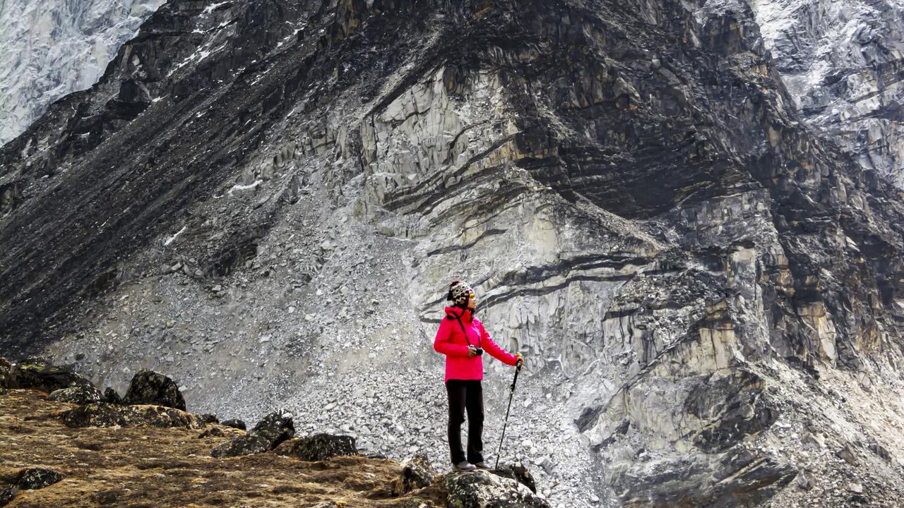 A visitor appreciates the view of Himalaya mountain during Everest Base Camp trekking in Nepal.Picture: Getty Images