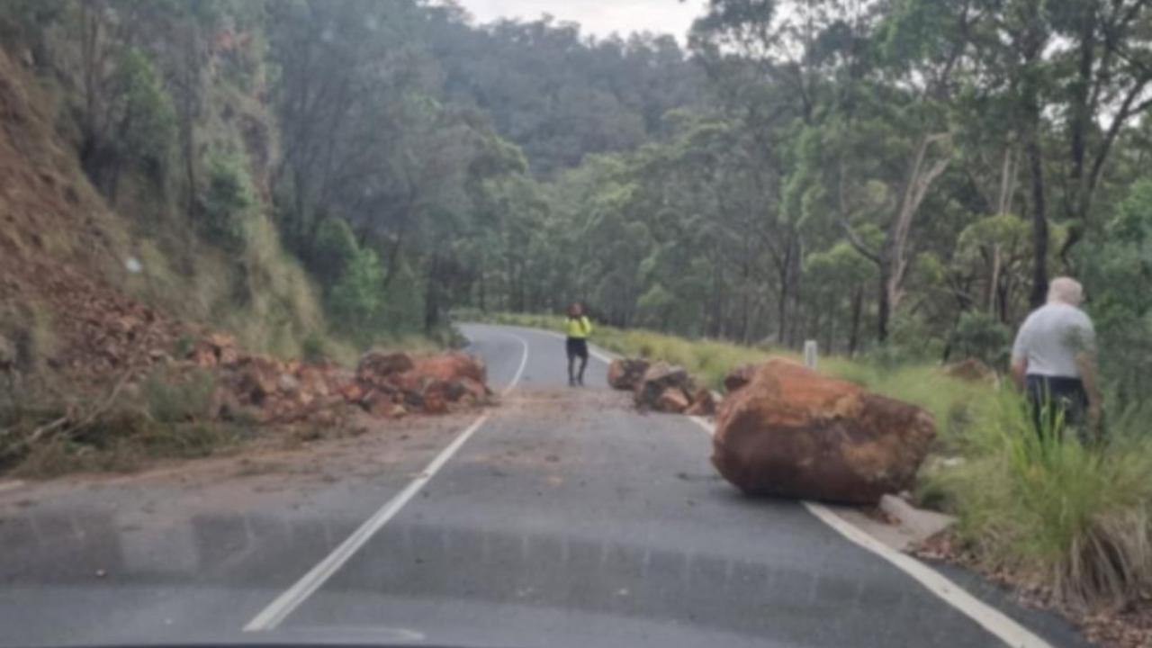 No council fix after boulders, rubble from rockslide blocks road