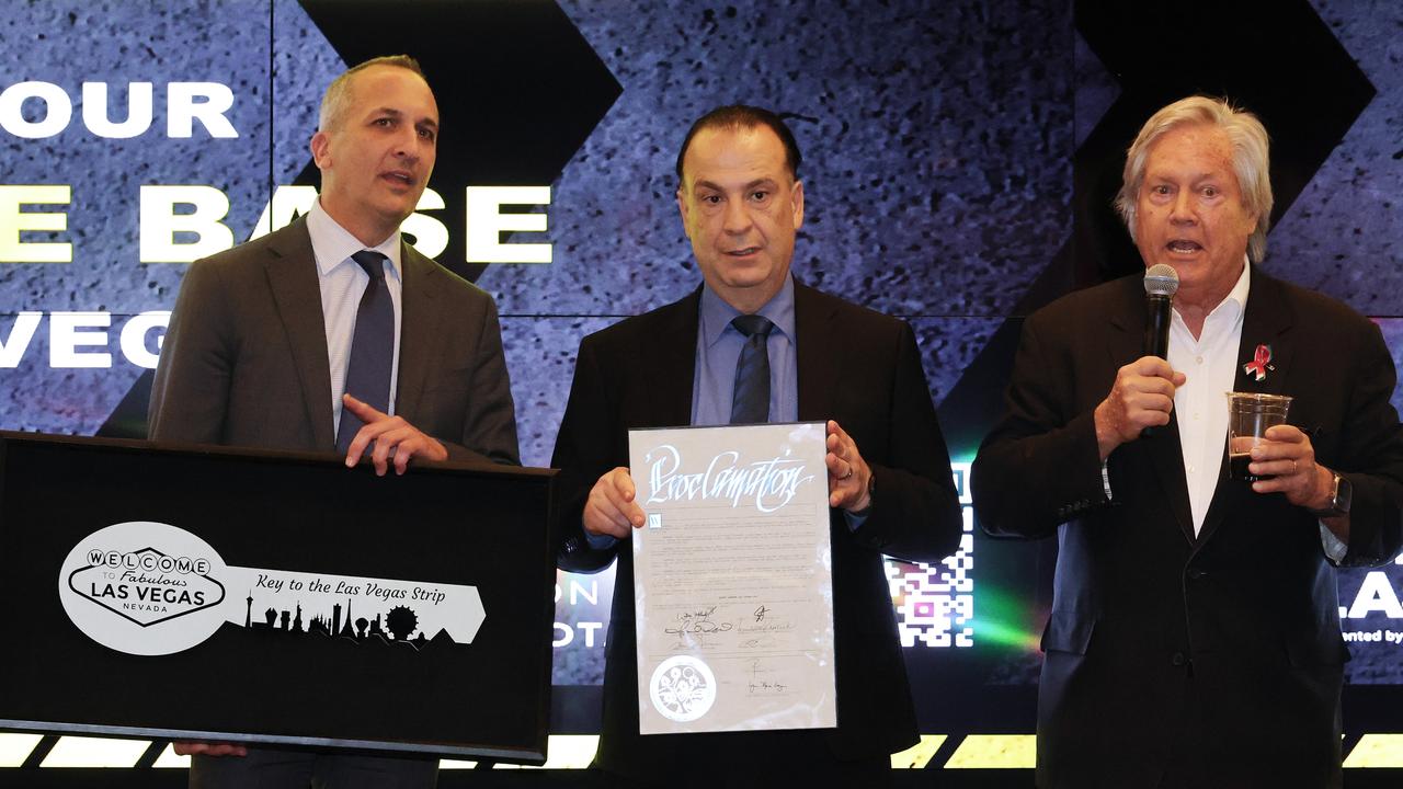 Andrew Abdo and Peter V'landys receive a ceremonial key to the Las Vegas Strip and a proclamation from Clark County Commissioner Chairman Tick Segerblom (right). (Photo by Ethan Miller/Getty Images)