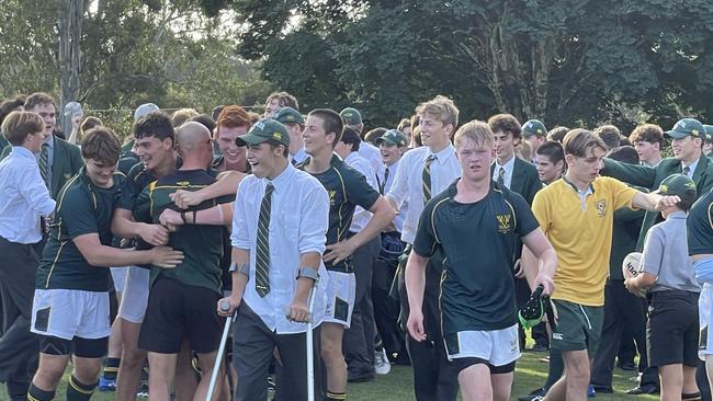 Cam Bukowski in crutches last season watching on as VNC's First XV get things done.