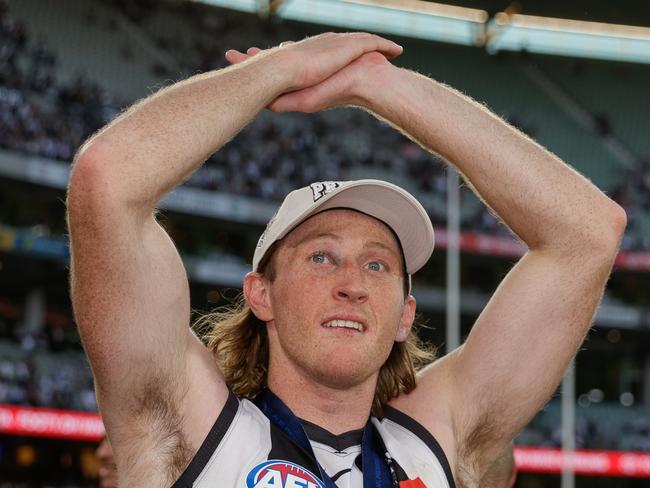 MELBOURNE, AUSTRALIA – SEPTEMBER 30: Nathan Murphy of the Magpies celebrates after the 2023 AFL Grand Final match between the Collingwood Magpies and the Brisbane Lions at the Melbourne Cricket Ground on September 30, 2023 in Melbourne, Australia. (Photo by Russell Freeman/AFL Photos via Getty Images)