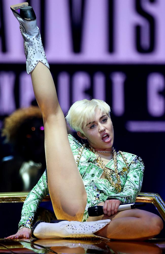 Sexed up ... pop superstar Miley Cyrus performs at London’s O2 Arena.