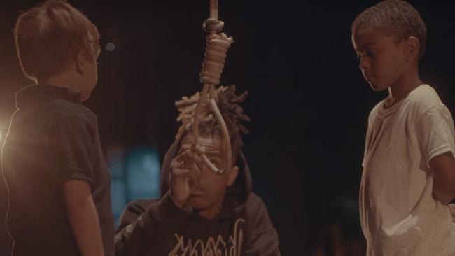 Stills from controversial XXXTentacion music video for his latest track "Look At Me!" which depicts him hanging a small white boy. Source: YouTube