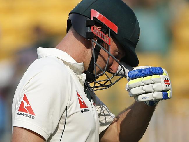 Australia's Shaun Marsh leaves the ground after being dismissed during the second day of their second test cricket match against India in Bangalore, India, Sunday, March 5, 2017. (AP Photo/Aijaz Rahi)