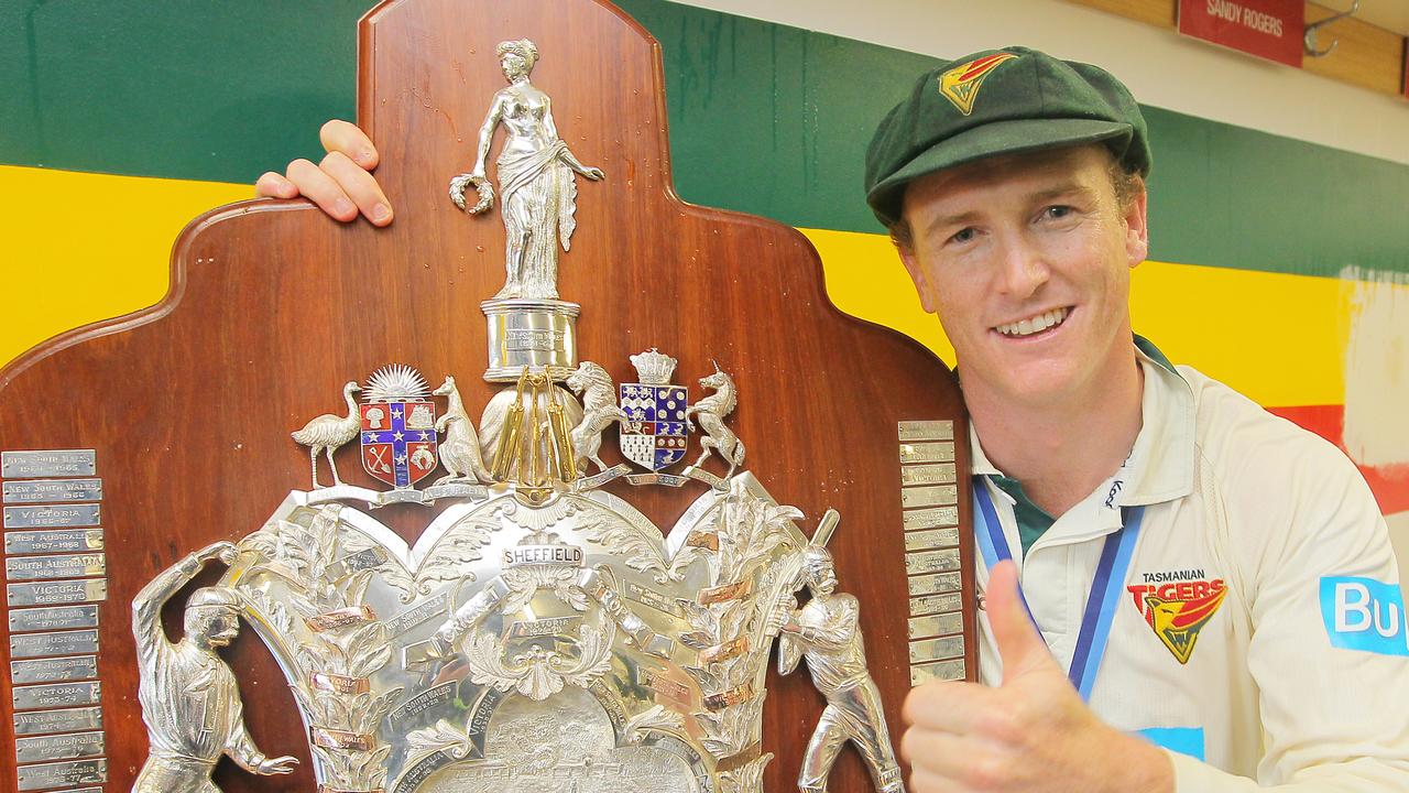 George Bailey with the shield. Tasmania celebrates winning the Sheffield Shield cricket final against Queensland at Blundstone arena Bellerive.