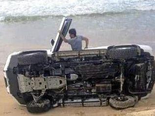 A driver in a new looking Prado is the latest victim of soft sand and big drop offs on Teewah beach.