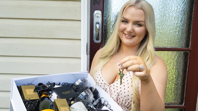 Amie Storey of Settlement Day by Boxed with her gift boxes. Picture: Kevin Farmer